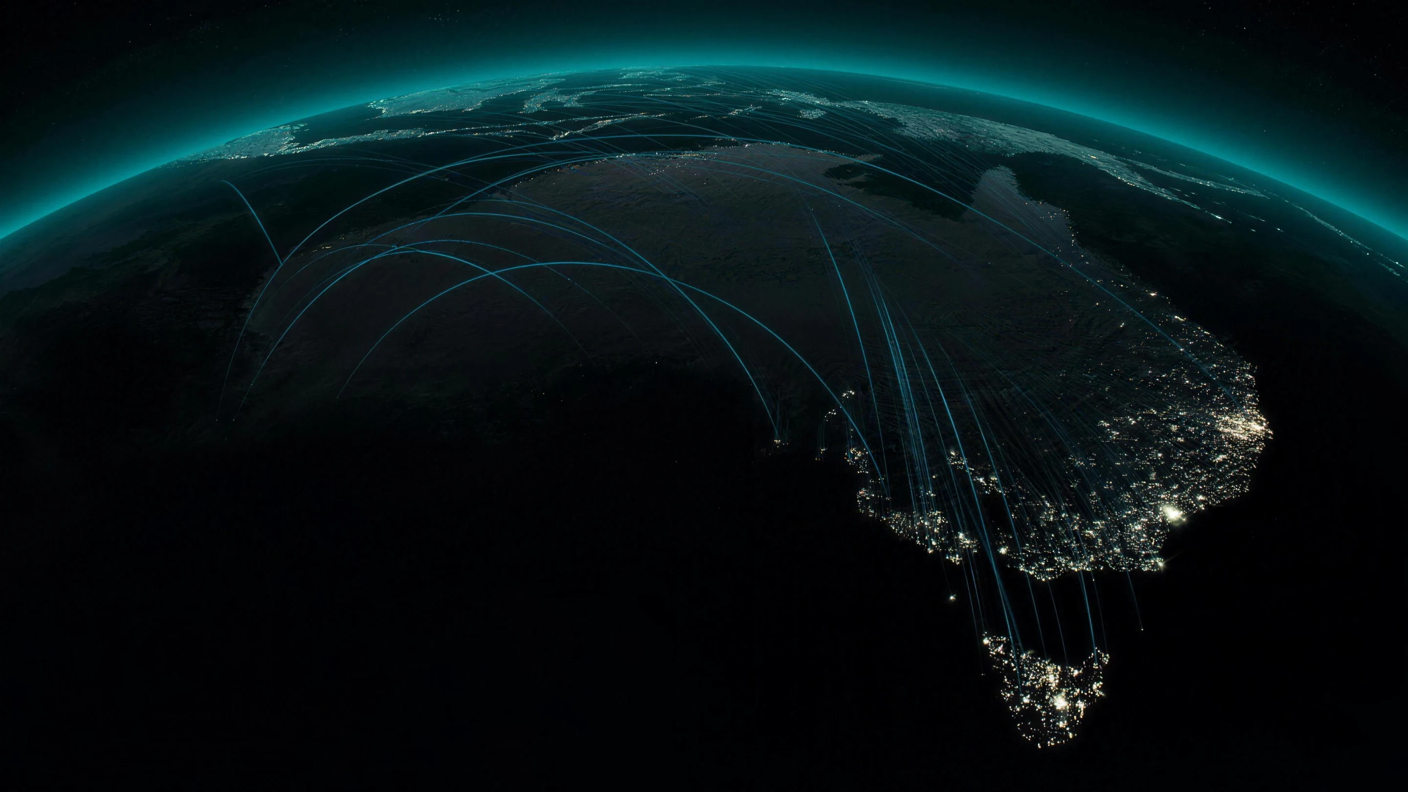 Australia at night, city lights joined by a glowing data network
